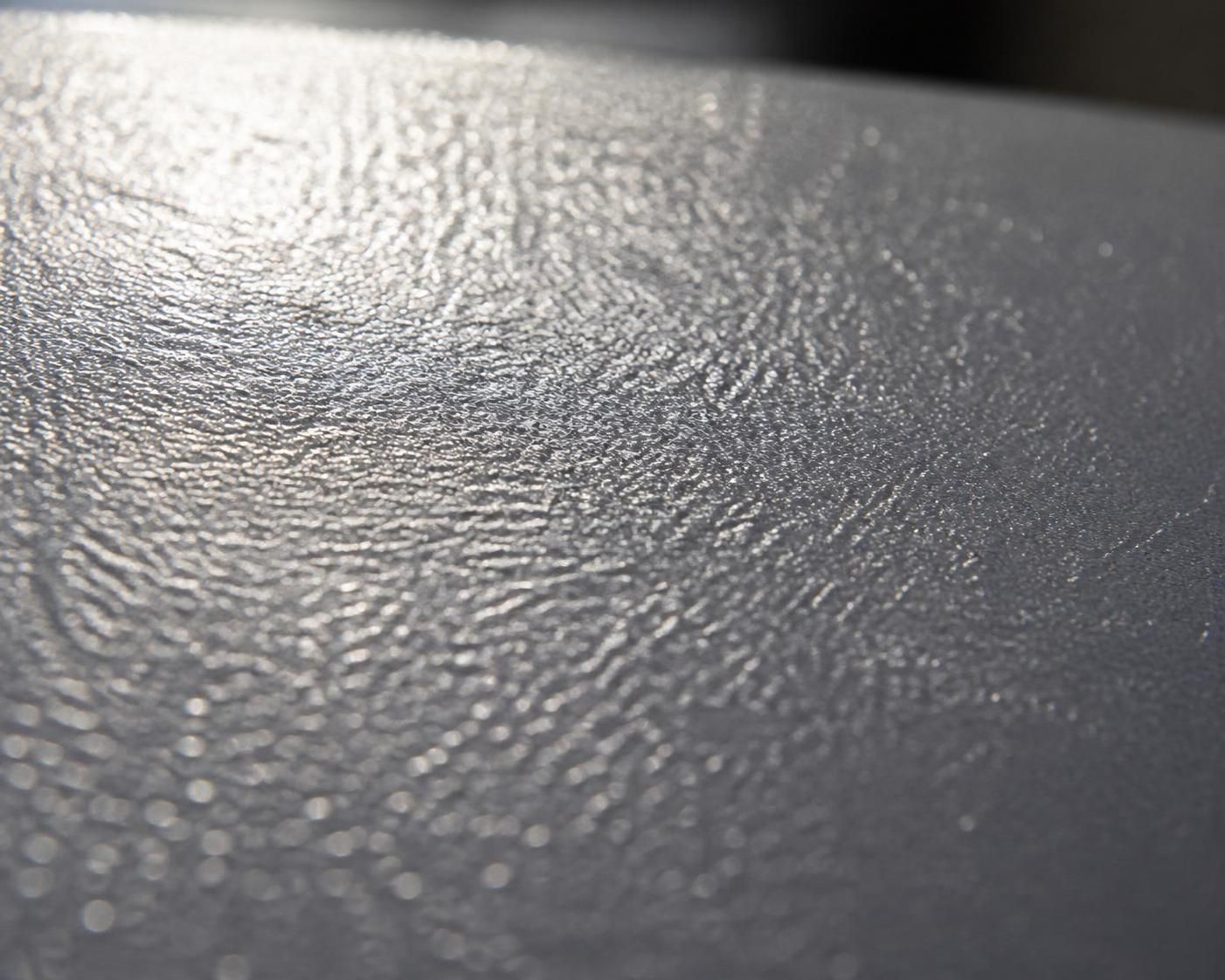 Peau d'orange : reflet ondulé à la surface du vernis